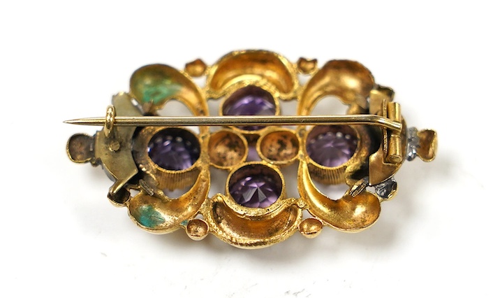 An early 20th century gilt metal and amethyst paste cluster set brooch, 44mm. Condition -poor.